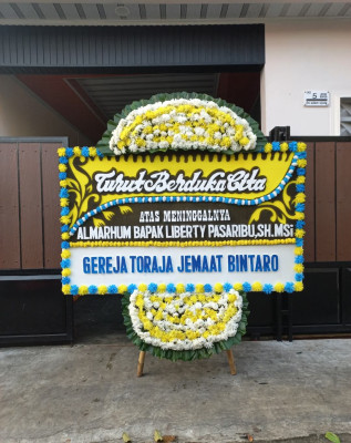 Papan Bunga Duka di Waborobo
